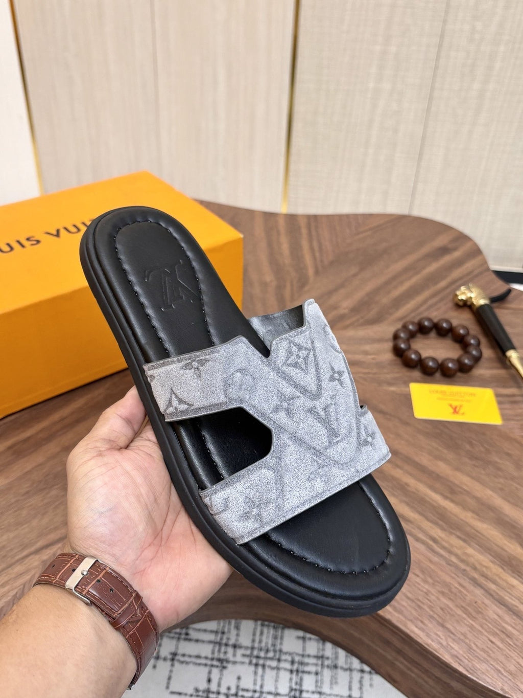 Louis Vuitton Light-Gray Patterned Slide Sandals — model