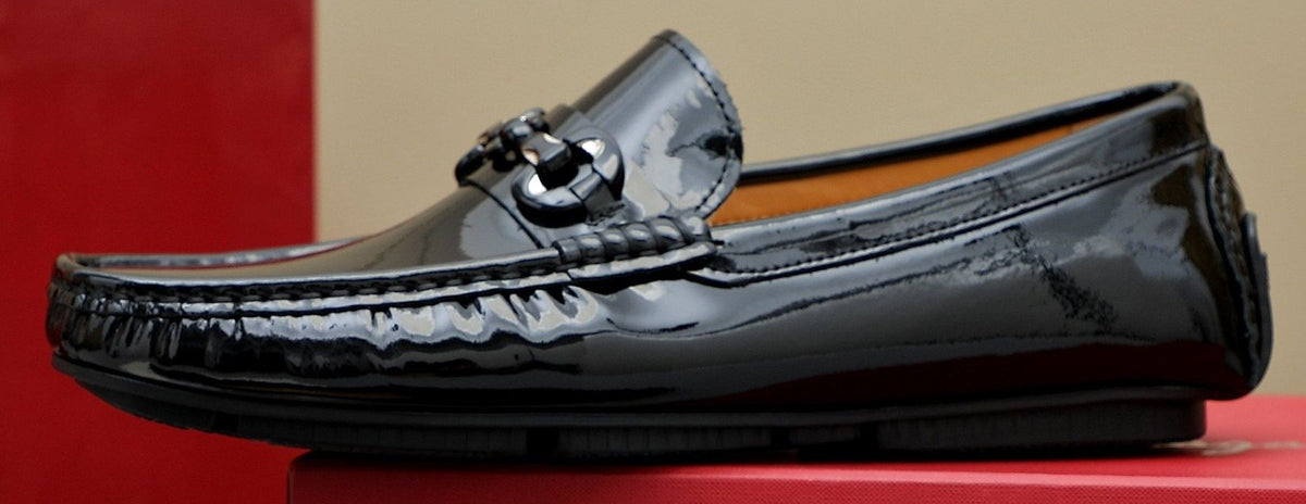 Ferragamo Black Metal Bit Loafers — front