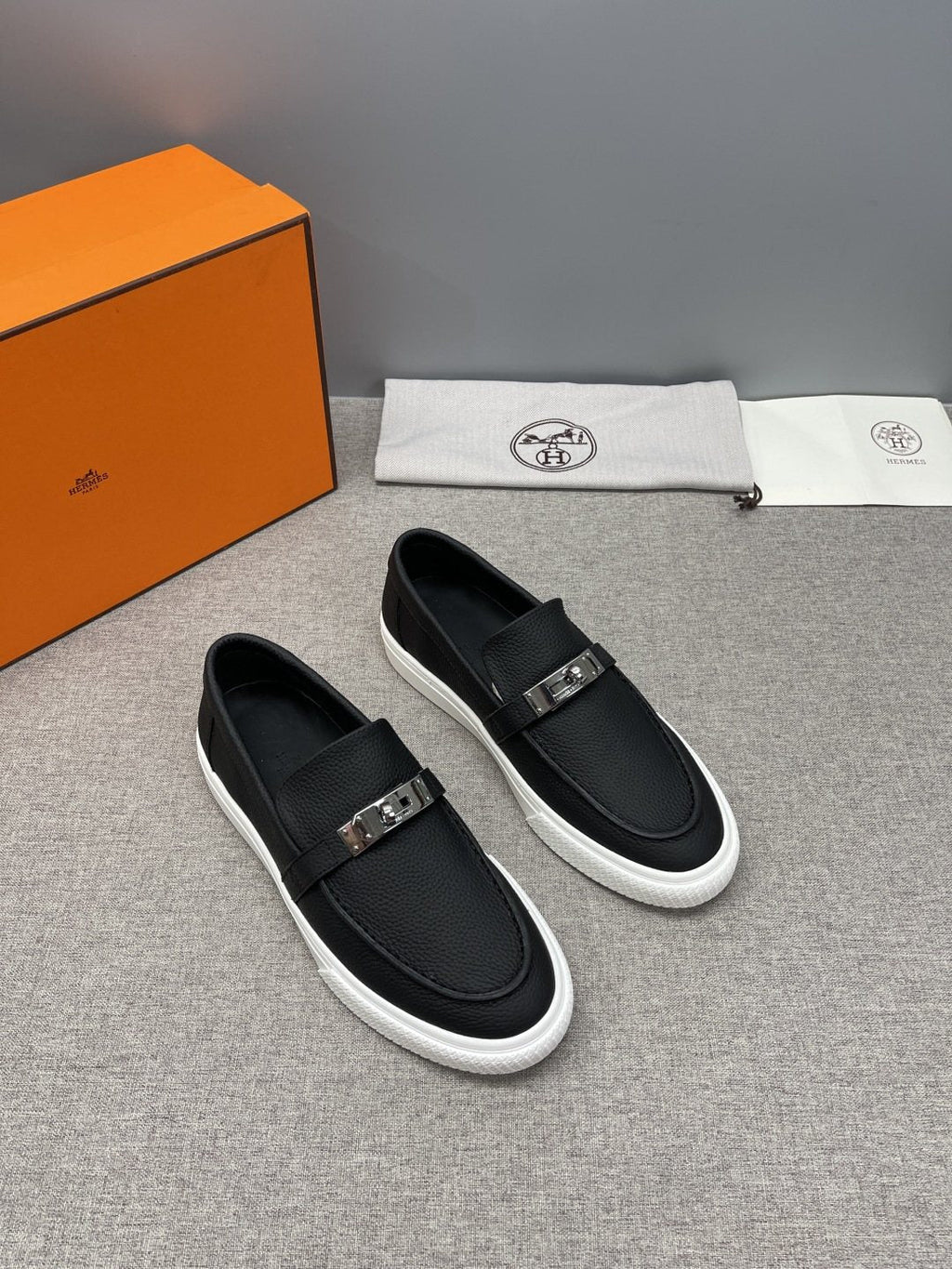 Hermès Textured Bar Loafers — side