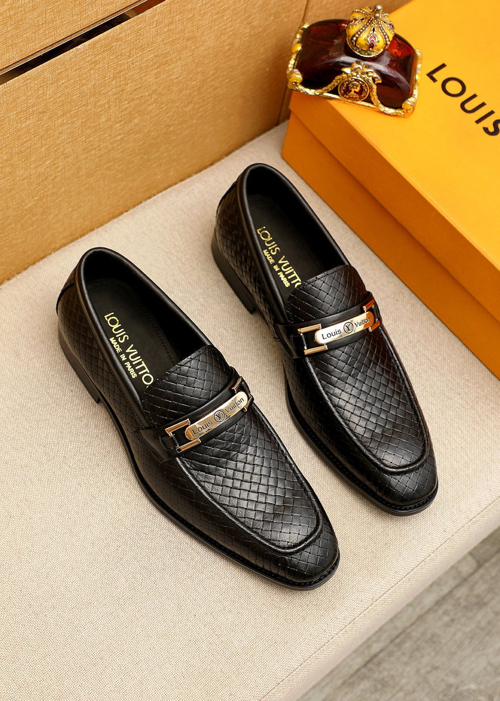 Louis Vuitton Brown Embossed Buckle Loafers — front